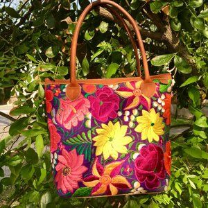 Floral embroidered tote bag with leather details